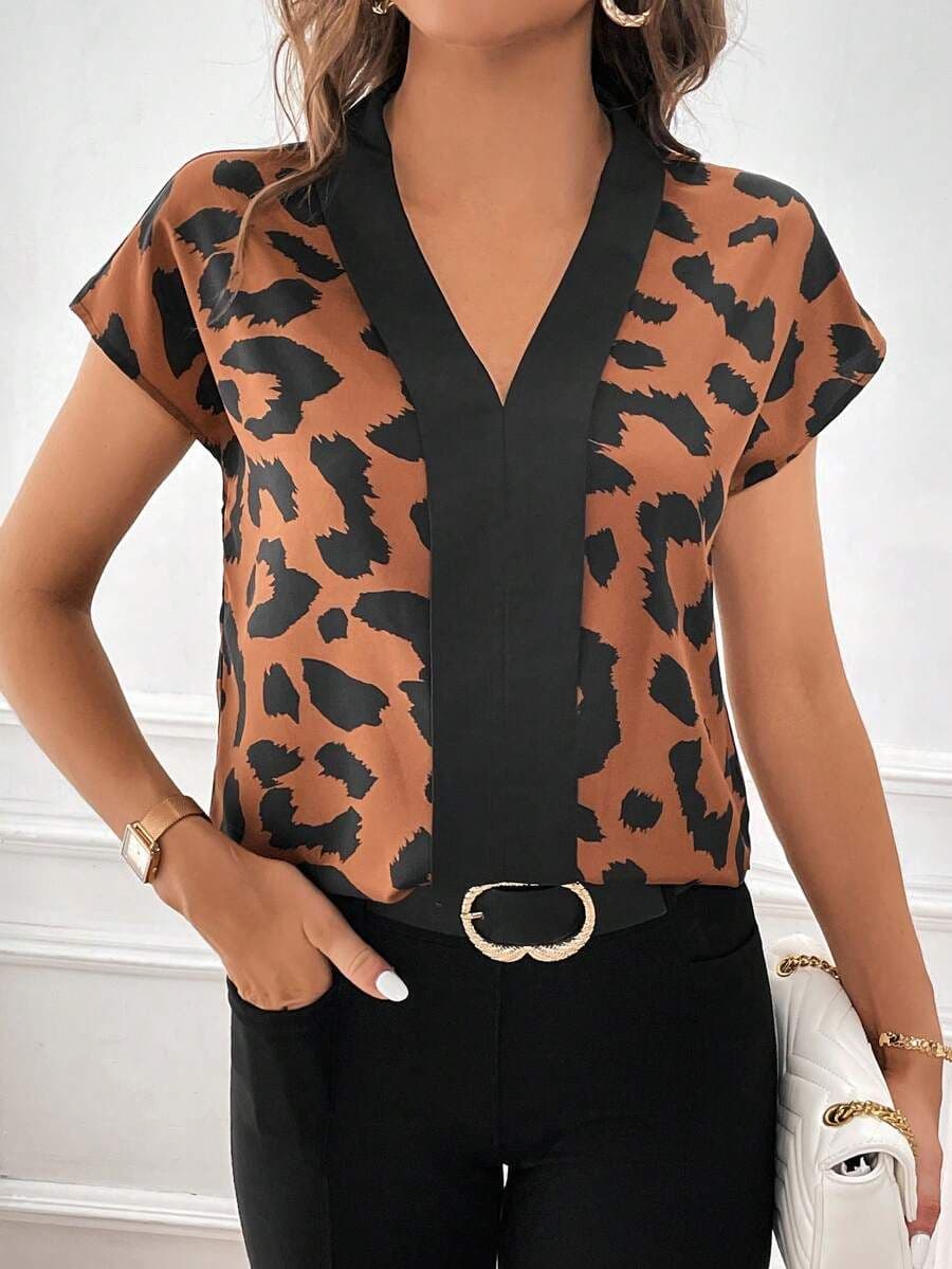 Blouse met luipaardprint en vleermuismouwen M